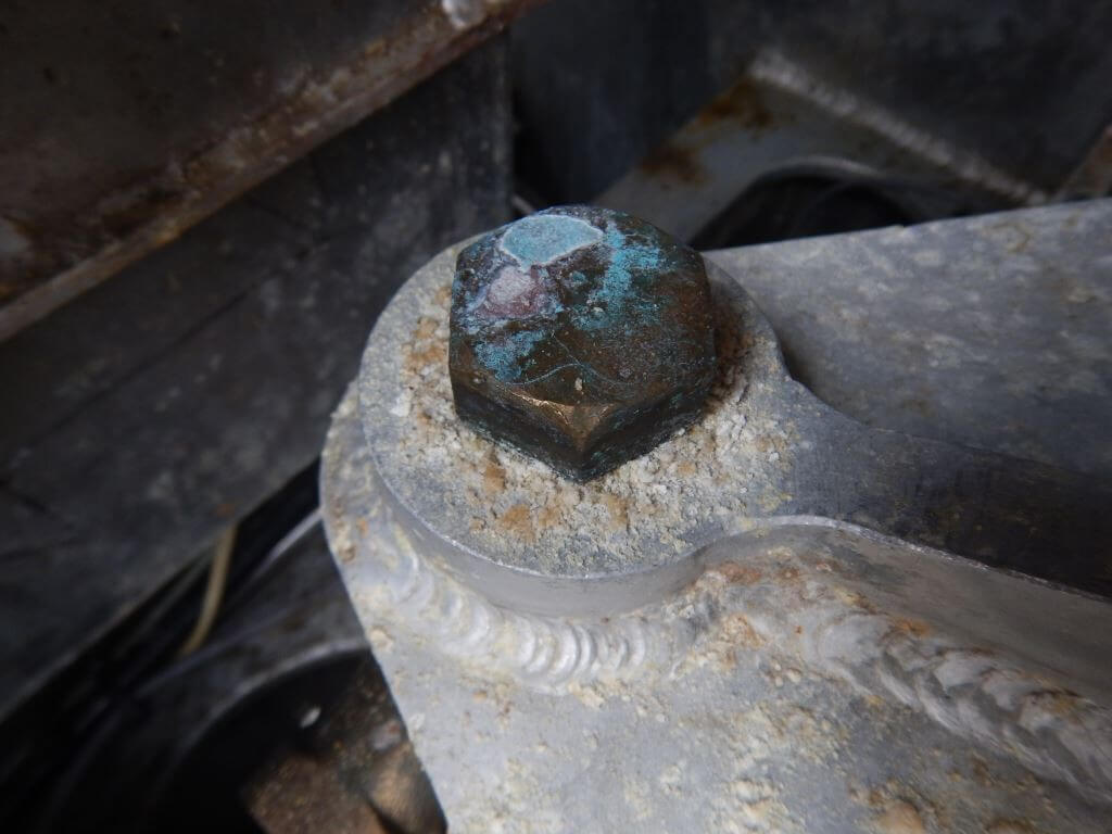 Galvanic corrosion of bronze screws in aluminum equipment